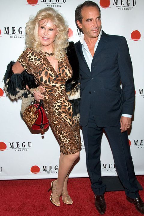 Jocelyn Wildenstein and her husband pose a picture.